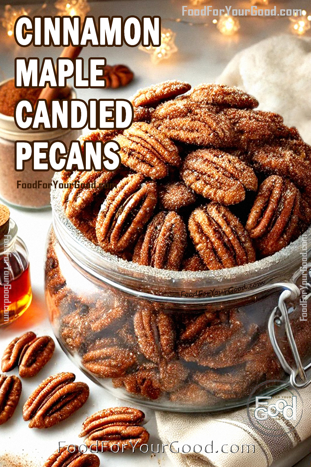 Crunchy Cinnamon Maple Candied Pecans in a glass jar, dusted with sugar and spices, surrounded by maple syrup and pecans on a festive table.