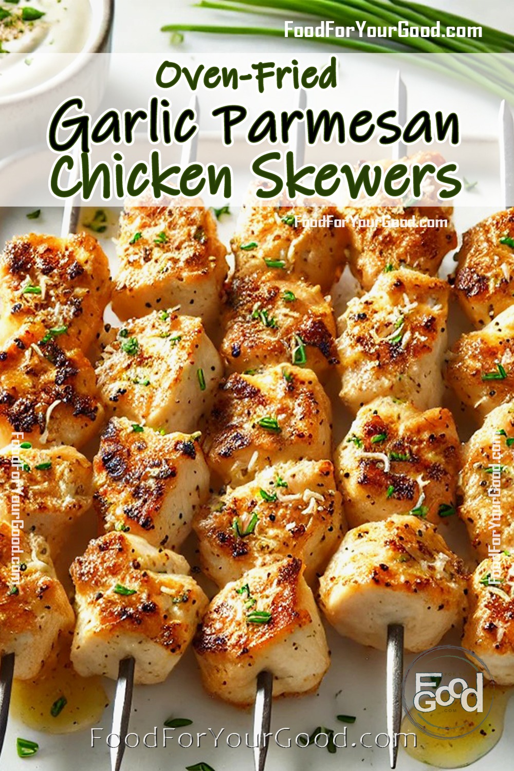 Golden and juicy Oven-Fried Garlic Parmesan Chicken Skewers garnished with fresh parsley and served with creamy dipping sauce.