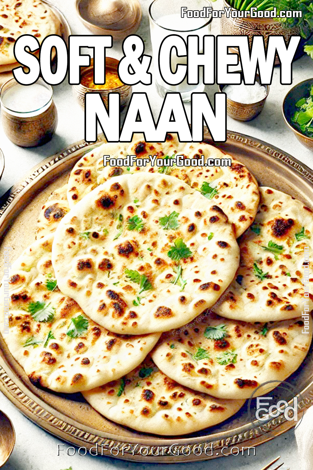 Soft & Chewy Naan on a beautifully arranged platter, sprinkled with fresh cilantro. A warm, golden-brown naan bread recipe featured on FoodForYourGood.com, perfect for pairing with curries, dips, or as a standalone flatbread.